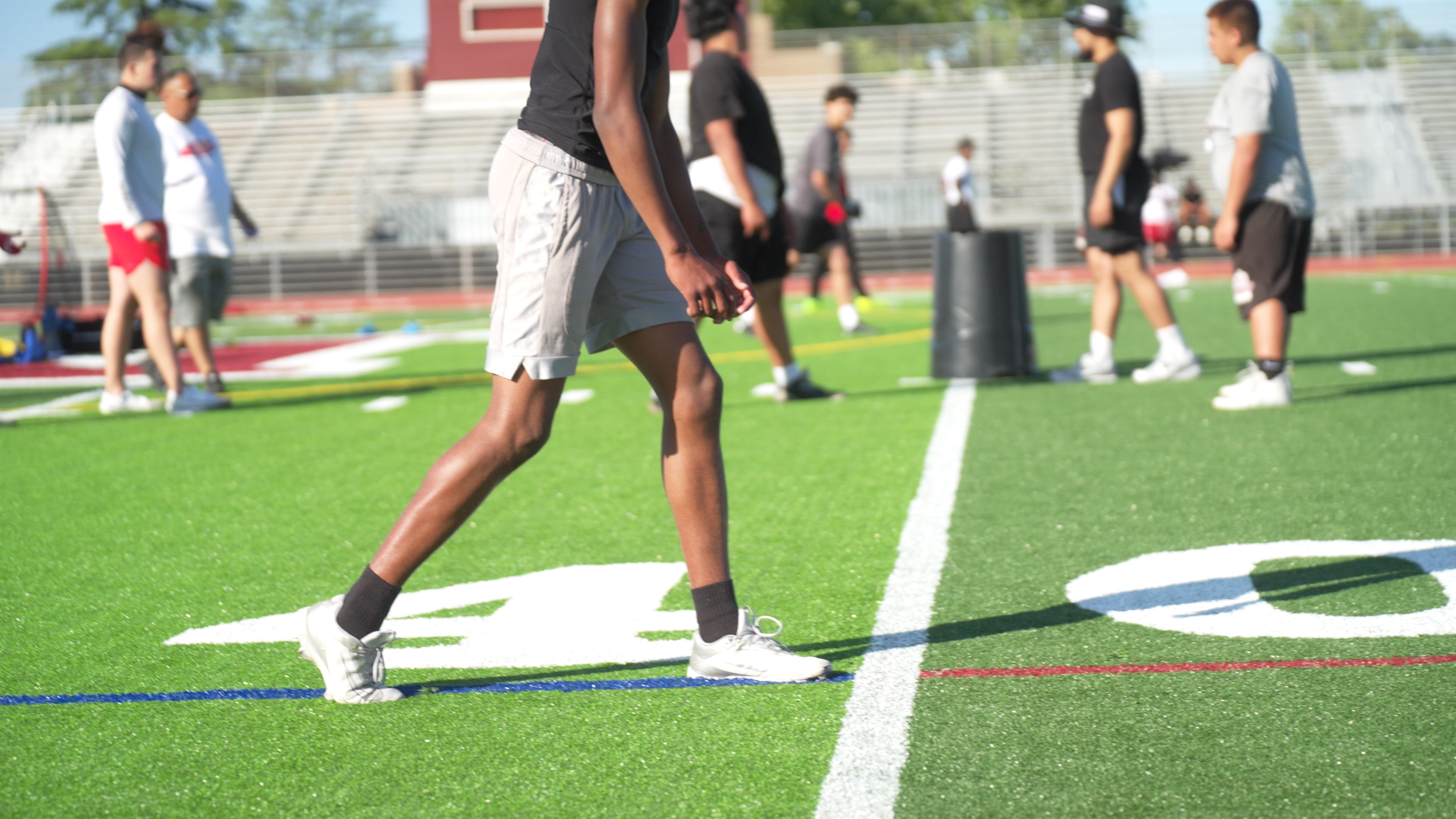 Kids practicing on an artificial turf field